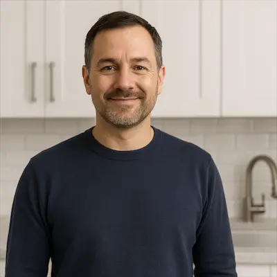 Mark in his Nepean kitchen with newly installed tile backsplash